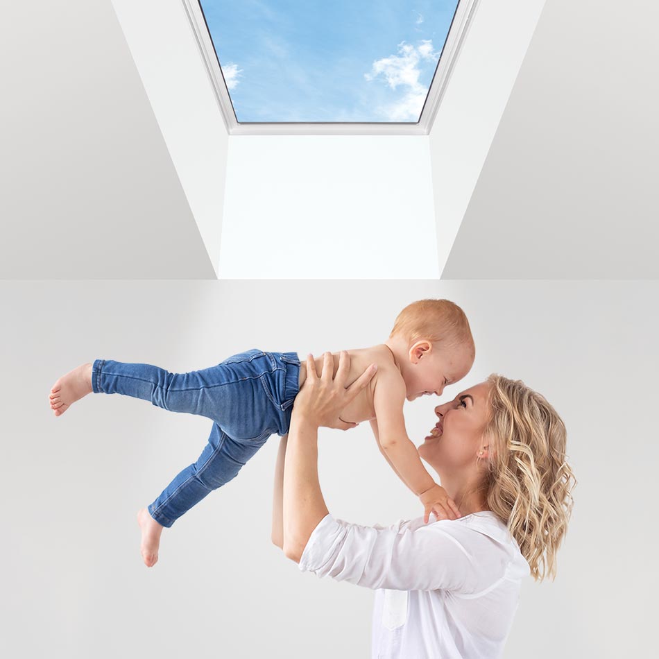 mom and baby under skylight