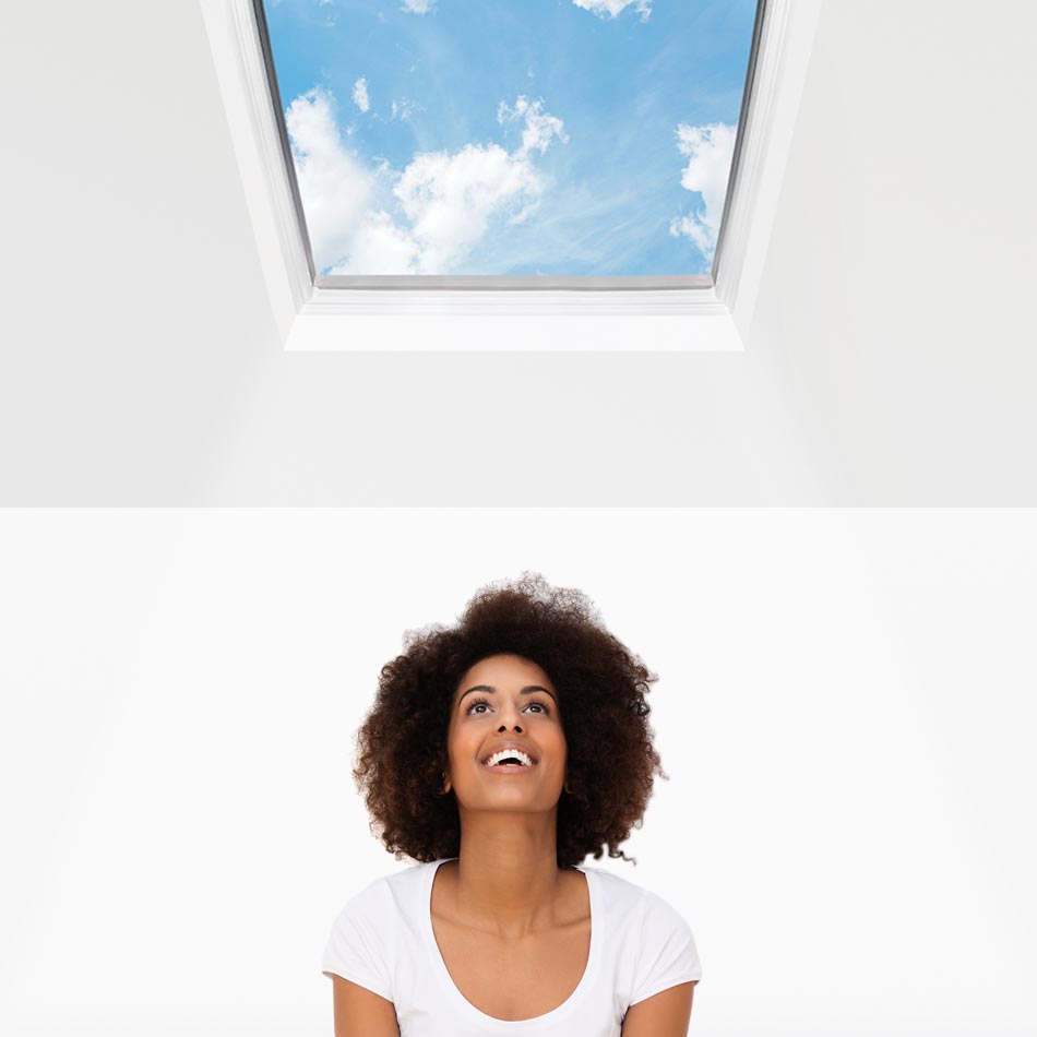 woman under polycarbonate skylight