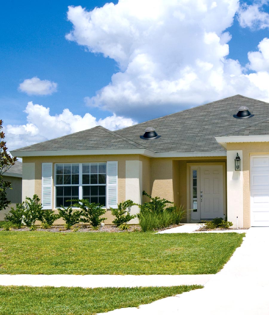 Two Kennedy K series pitched tubular skylights on home